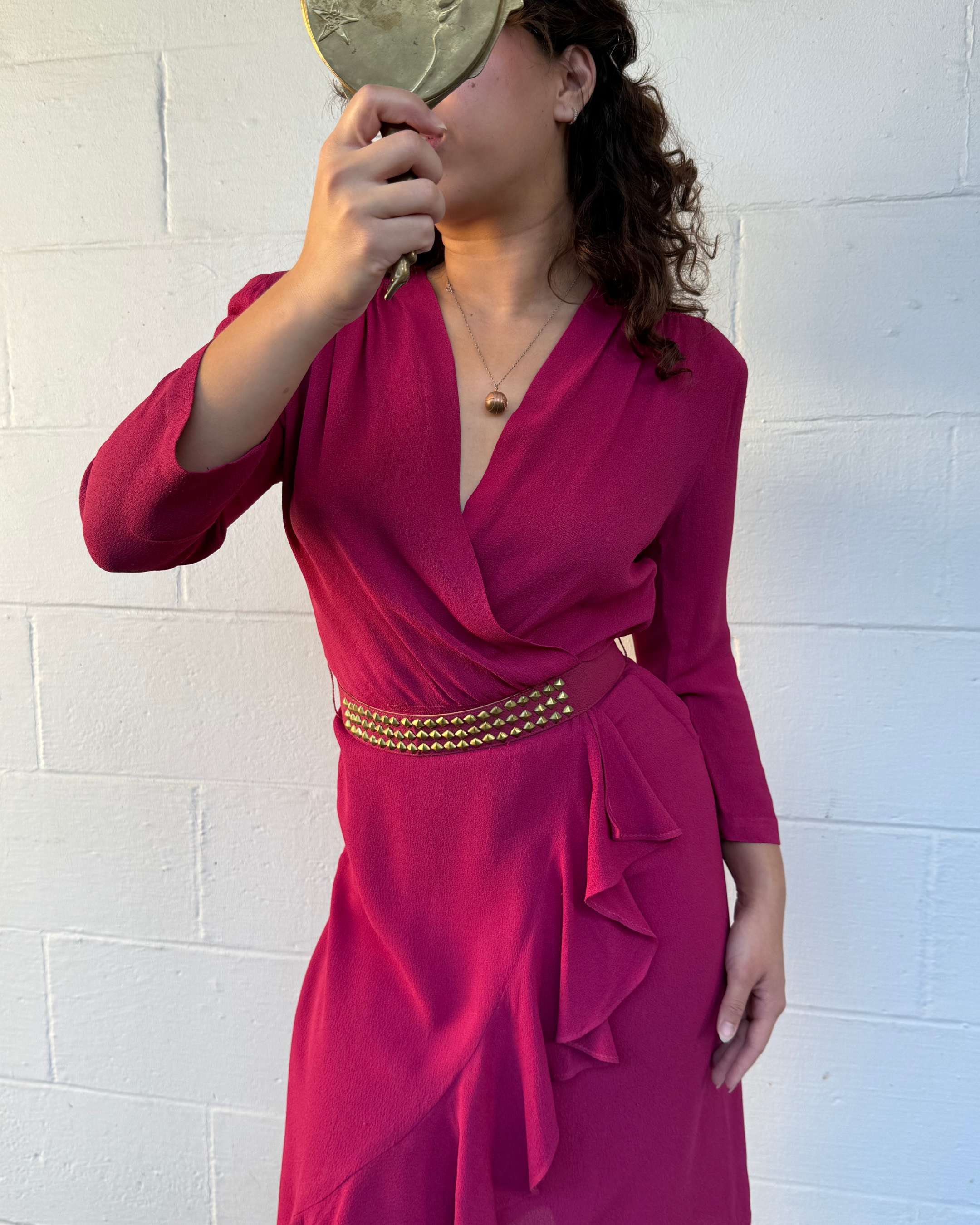 1940s raspberry ruffle hem dress with brass studded belt