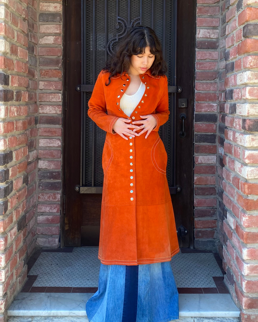 Fantastic 1970s orange suede coat